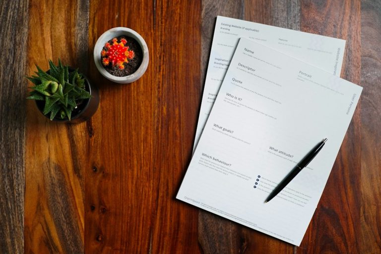 Invoices and paperwork on an office desk